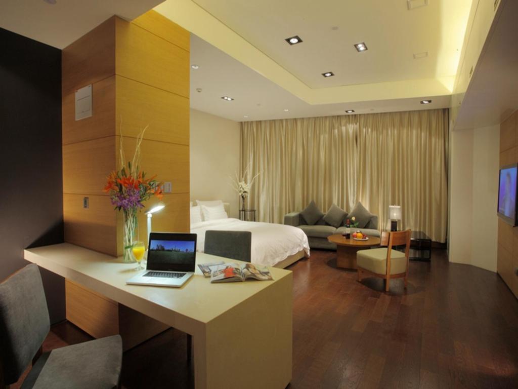 Grand Madison Qingdao Harbour-View Central（Former Qingdao Farglory Hotel） Habitación foto